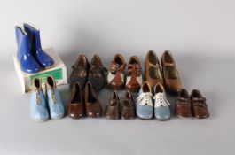 A collection of children's shoes, including: 1920s brown leather baby shoes, 1940s blue boots