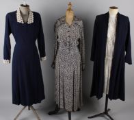 A 1940s navy blue wool crepe dress with a lace trimmed collar; together with a 1940s patterned crepe