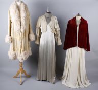 A 1920s cream devore velvet evening coat with fur trim; together with a 1930s eau de Nil satin crepe