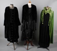 A 1920s black silk beaded dress with tassels, with a 1920s devore evening dress, a green velvet