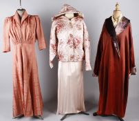 A collection of ladies night attire, including: a green Oriental satin dressing gown, a 1940s