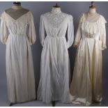 A Regency style white organdie dress and slip; together with a Victorian style cream satin and