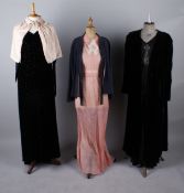 A 1930s black satin crepe evening gown with bead and diamante Art Deco style motif; together with