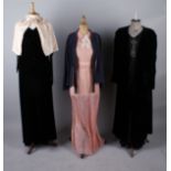 A 1930s black satin crepe evening gown with bead and diamante Art Deco style motif; together with