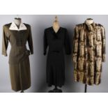 An olive green grosgrain 1950s dress with embroidered bodice; together with a faux fur 1940s coat