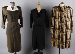 An olive green grosgrain 1950s dress with embroidered bodice; together with a faux fur 1940s coat