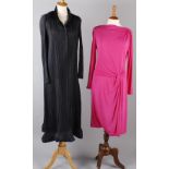 An Issey Miyake dark grey finely pleated long shirt-style dress; together with a hot pink Armani