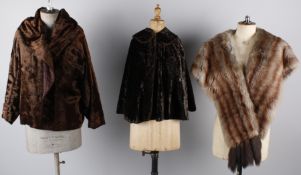 A collection of vintage fur garments, including: a 1930s faux fur jacket, a 1940s fox fur cape, a