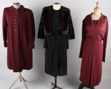 A quantity of vintage ladies clothing, comprising: a 1930s burgundy dress, a 1940s wool dress with