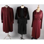 A quantity of vintage ladies clothing, comprising: a 1930s burgundy dress, a 1940s wool dress with