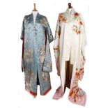 A blue silk Oriental robe, embroidered with a design of baskets of fruit and trailing foliage worked