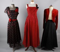 A 1950s gold coloured evening dress, an organdie full length dress by Caro Creation, a red brocade