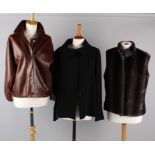 A Jil Sander brown soft leather cropped jacket; with a charcoal grey padded jacket, a silk-lined