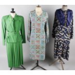 A 1920s wool coat with a striped lining; a 1930s floral chiffon dress and bolero (repairs), a