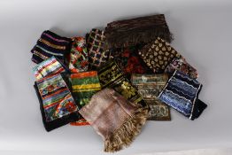 A collection of early 20th century scarves and cravats, comprising: 1930s floral, geometric