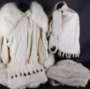 A French 1920s white ermine coat, with an attached cape with white Artic fox collar and velvet
