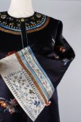 A late 19th/early 20th century Chinese silk embroidered coat with a turquoise lining, the coat is