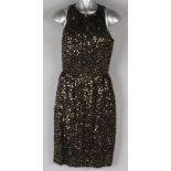 An early 1990s Murray Arbeid of London black sleeveless beaded and sequinned crepe cocktail dress,
