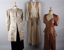 A 1930s fawn coloured evening dress and matching jacket with gold bead decoration; with a brown