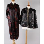 A mid 20th century black and red silk robe from Hong Kong, the label reads 'Ho Ho, Hong Kong';