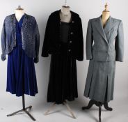 A collection of ladies costume, comprising: a 1940s blue/grey tweed two-piece suit with the