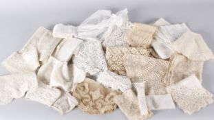 A collection of 19th and early 20th century lace, including: collars, caps, good lengths of edgings,