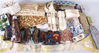 A large collection of early to mid 20th century lengths of embroidered and woven trimmings, suitable