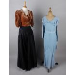 A 1930s pale blue pleated crepe full length dress; with a 1930s black lace dress with belt, a full-