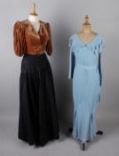 A 1930s pale blue pleated crepe full length dress; with a 1930s black lace dress with belt, a full-