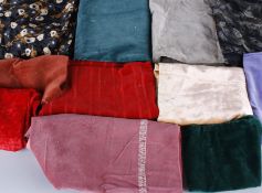 A large collection of early to mid century velvet dress making and light upholstery weight