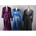 A collection of ladies night attire, including: a purple velvet housecoat, a 1940s CC41 utility