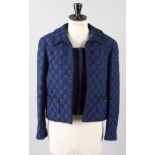 A 1990s Chanel Boutique silk-lined black and blue boucle wool box style jacket, with matching