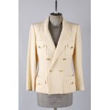 A 1990s Chanel Boutique buttermilk coloured boucle long-line double-breasted wool jacket, 'Chanel