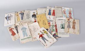 A large collection of vintage sewing patterns dating from the 1930s to the early 1960s, for ladies