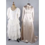 Six vintage wedding dresses, comprising: a cream 1960s wedding dress, a 1960s brocade wedding dress,