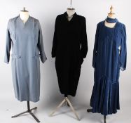 A 1920s slate grey embroidered jacket; with a 1920s blue wool dress, a 1930s blue velvet dress, a