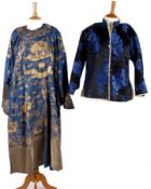 A Chinese blue silk robe embroidered with dragons in gold metallic thread with gilt metal button and