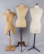 A Yugin & Sons female mannequin, with a pale linen torso on a metal base; with a late 20th century