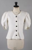 A Jean Muir Studio white quilt-effect single breasted jacket, with short sleeves gathered at the