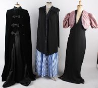 A 1950s black ballgown with underskirt; together with a 1960s full length pink evening coat, a black