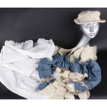 A 19th century wedding costume, comprising: a two-piece blue and cream grosgrain and silk blouse,