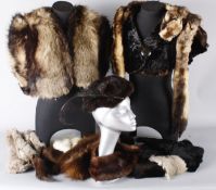 A quantity of vintage fur garments, including: fur capes, collars, hats and gloves, (qty).