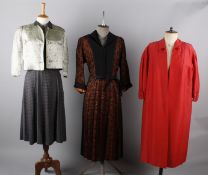 A 1940s russet coloured dress with bead decoration to the collar, a late 1940s black lace over