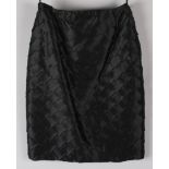 A Murray Arbeid of London early 1990s sample black silk skirt, the fabric layered in an