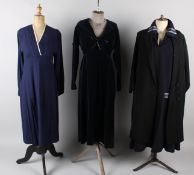 A 1920s grosgrain black coat with brocade lining; together with a 1920s navy blue day dress, a 1920s