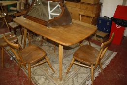 An Ercol elm dining room suite to include a sideboard, dining table and set of six spindle back