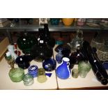 An assortment of coloured glass including three various friggers and other items  Property of the