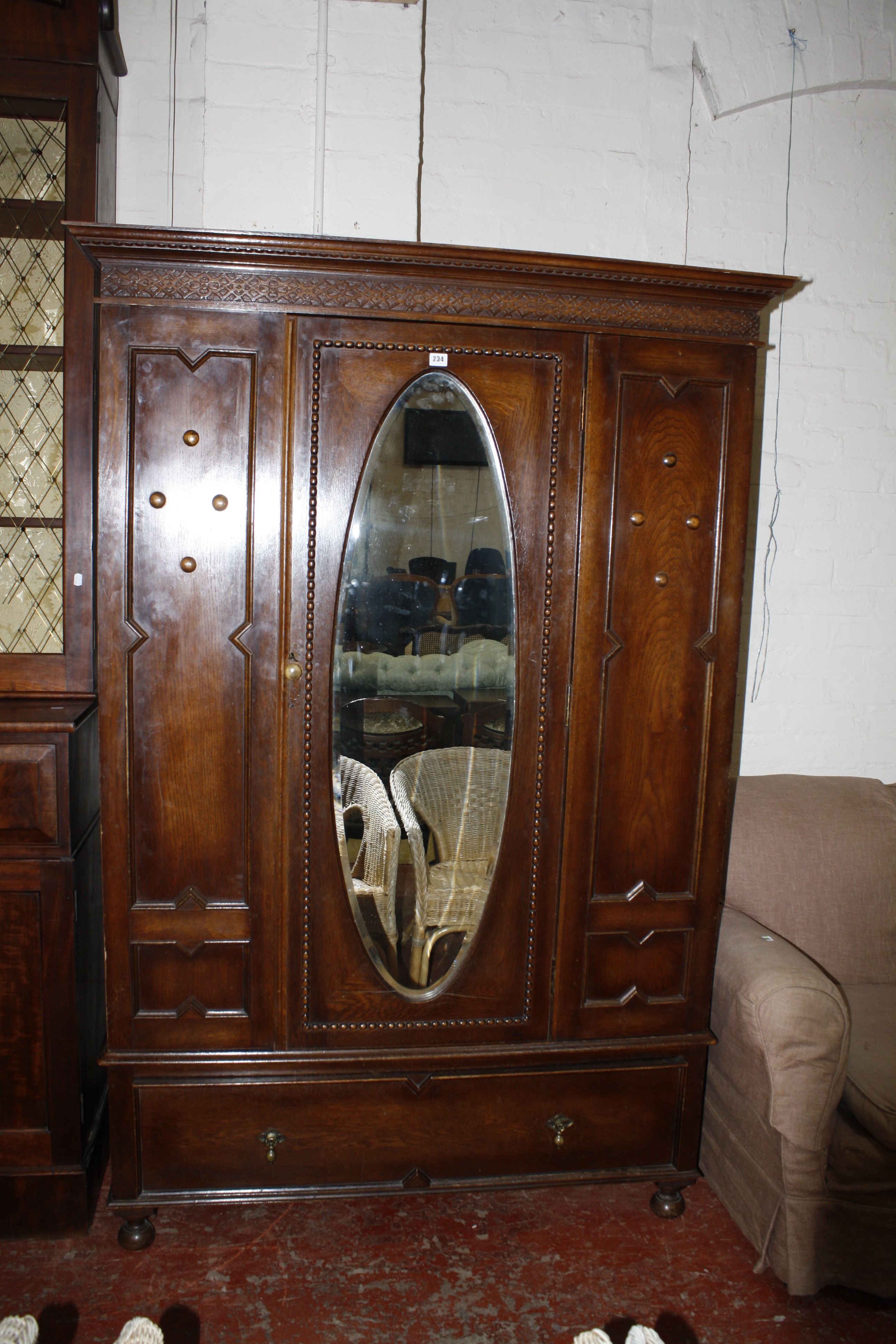 An oak wardrobe with mirror door and drawer below on bun feet - Image 2 of 2