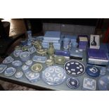 A quantity of Wedgwood Jasperware, largely in shades of blue, to include lidded trinket boxes,