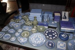 A quantity of Wedgwood Jasperware, largely in shades of blue, to include lidded trinket boxes,